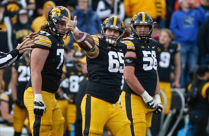 Iowa center Tyler Linderbaum celebrates first down